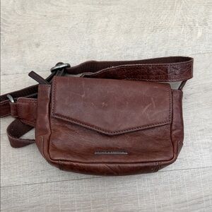 Spikes & Sparrow Missouri leather hip bag in dark brown.